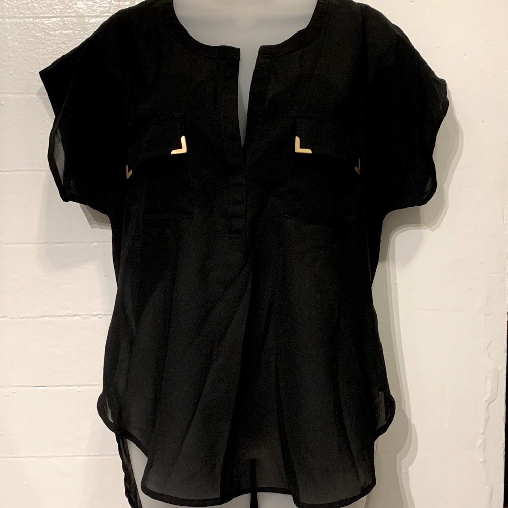 Live 4 Truth. Sheer black top.